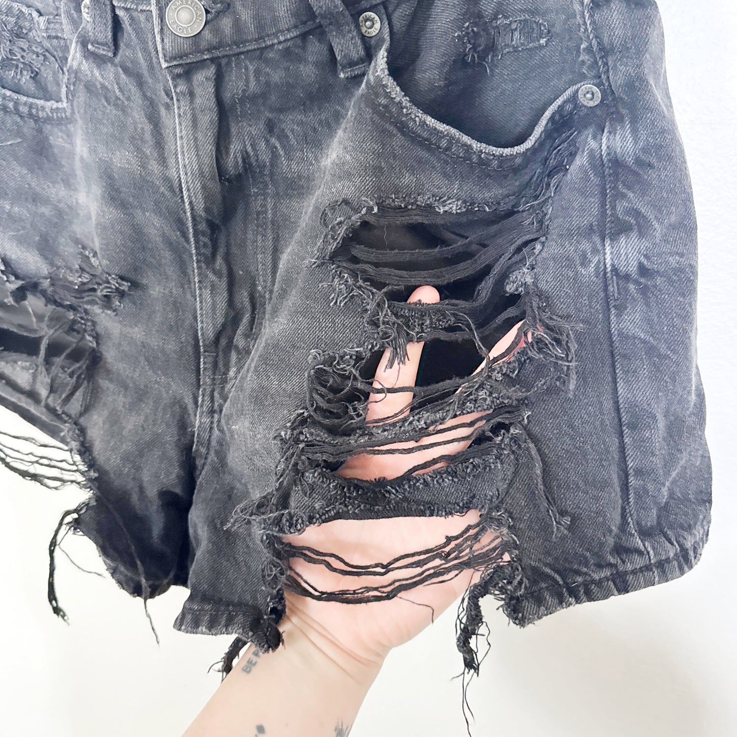 6 | American Eagle black distressed shorts