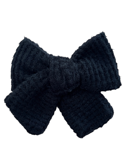 Black sweater pinwheel