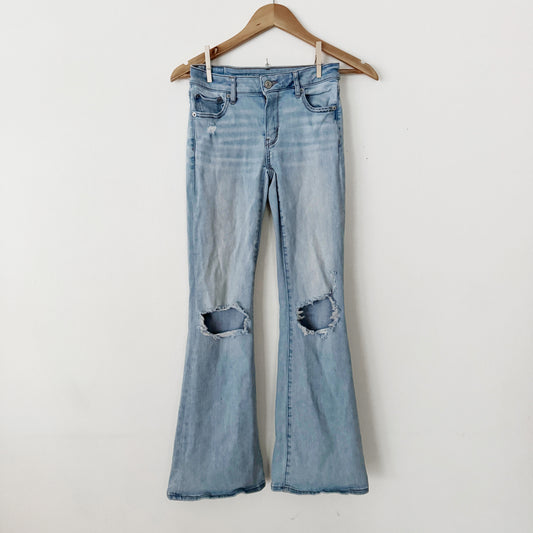 0 | American Eagle Light wash flares knee ripped jeans